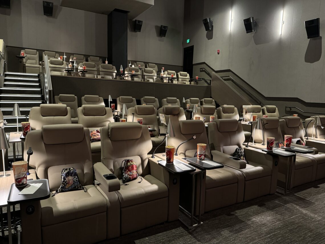 The private screening room at the Bay Theater set up before the kids arrived, with popcorn and stuffed-animal blankets on every seat.