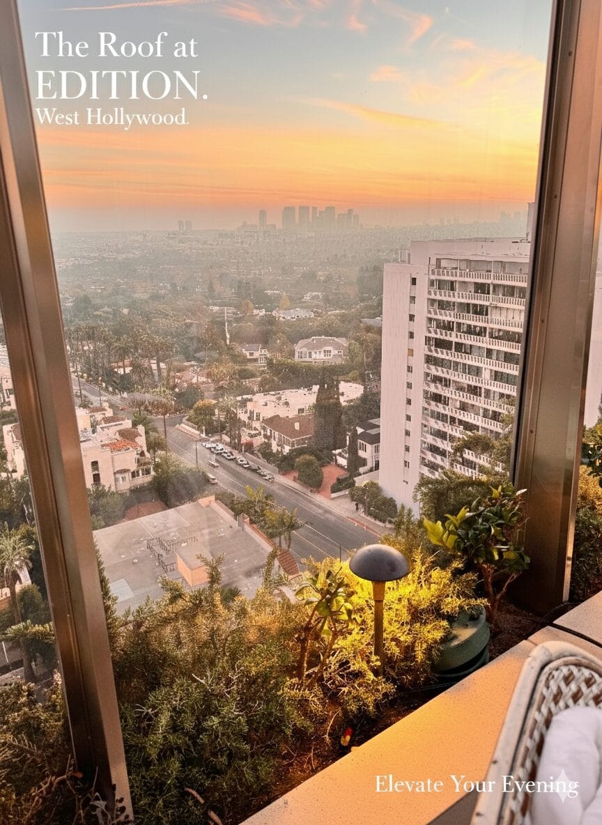A gourmet dinner spread including Short Rib Barbacoa Nachos and a Sun and Shade cocktail on a marble table at The Roof at EDITION, overlooking a golden West Hollywood sunset.