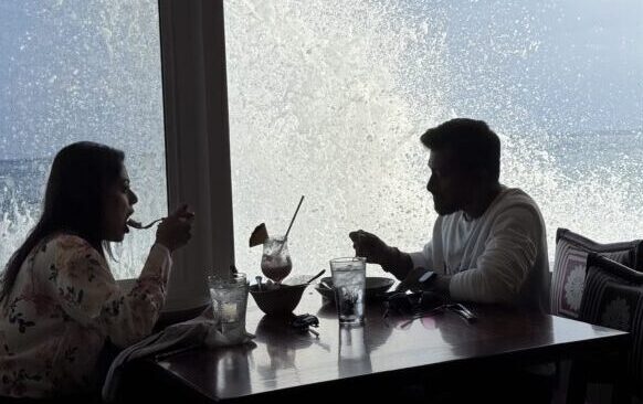 Waves crashing on the window at Duke's Malibu