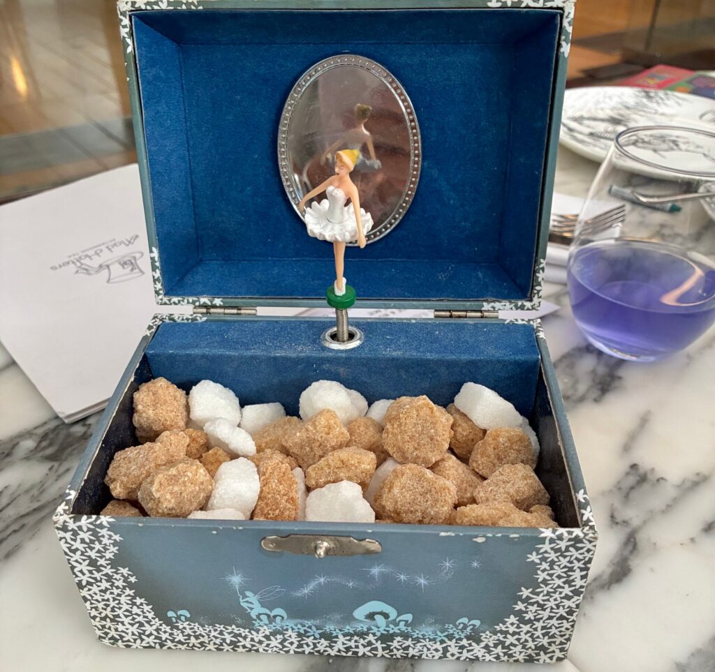Sugar cubes in a music box at the Mad Hatter’s Afternoon Tea, a highlight of our London with kids trip