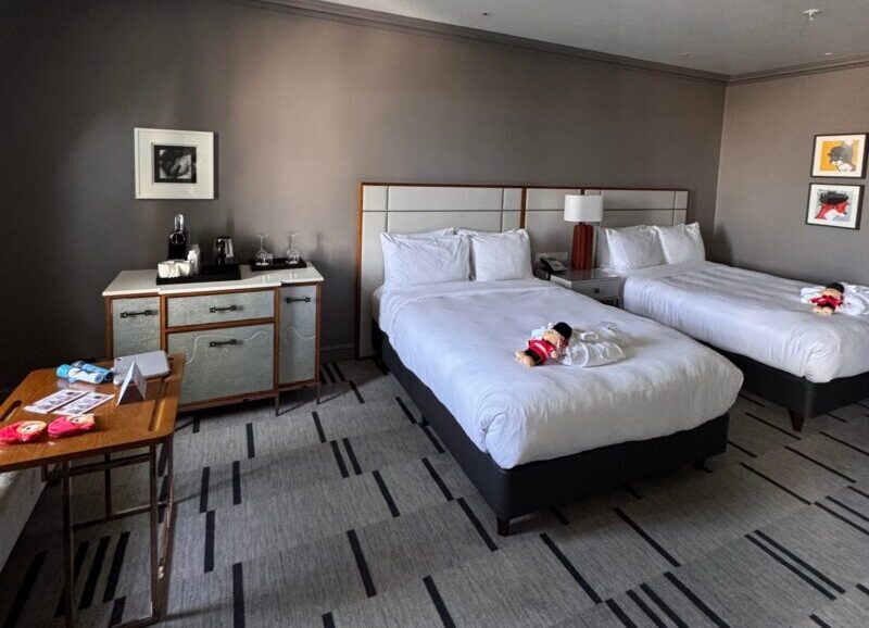 Two beds and a desk in a family room at the London Marriott Hotel County Hall