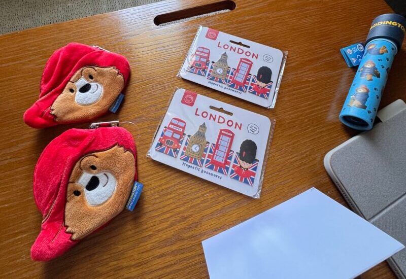 Paddington Bear coin purses, London bookmarks, and a kaleidoscope from the VIK goodie bag