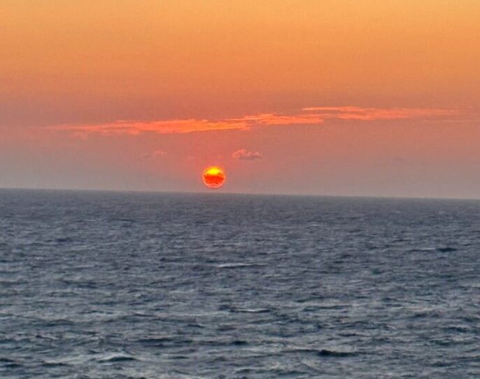 Sunset over the ocean from the Celebrity Apex