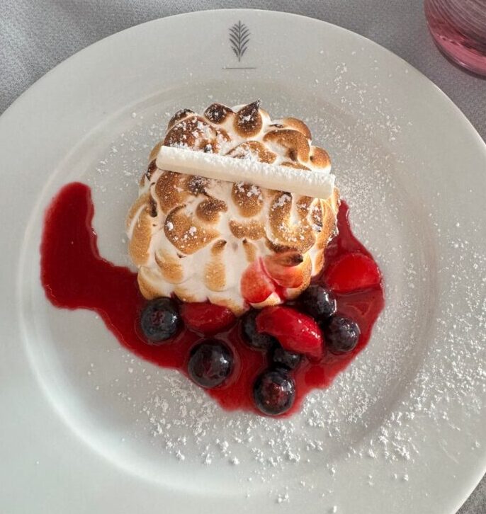 Baked Alaska with berries and berry sauce at Luminae on Celebrity Apex