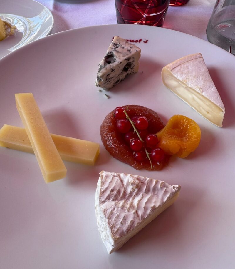 Plate of five French cheeses with fruit at Fouquet’s in Paris