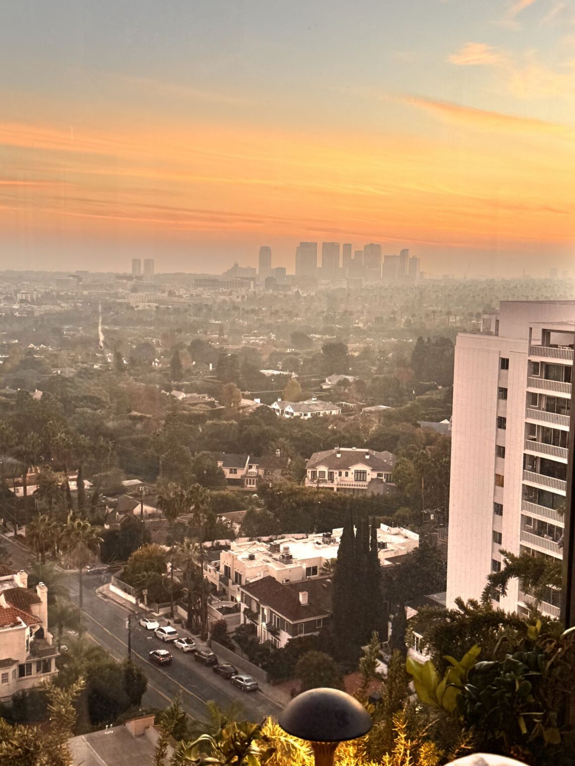 Sunset view over the West Hollywood skyline from The Roof at the West Hollywood Edition rooftop bar