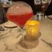 A vibrant La Flaca cocktail served at Telefèric Barcelona restaurant in Brentwood, showcasing its colorful presentation.