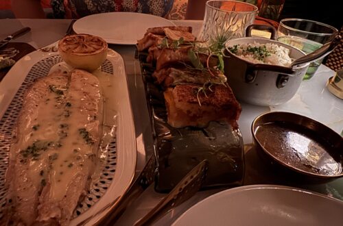 Dover sole with beurre blanc at La Monique Santa Monica, next to mini French onion grilled cheese