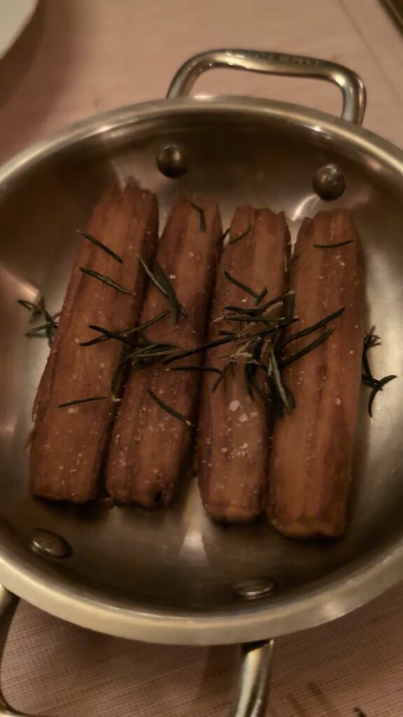 Crispy layered house potatoes (pommes pavé) with rosemary