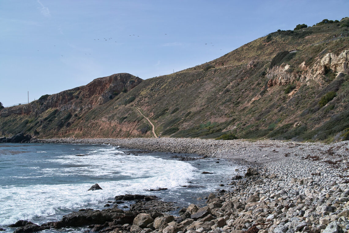 Rugged coastal bluffs and the Pacific Ocean along the Palos Verdes Peninsula, near where Nelson's at Terranea sits.