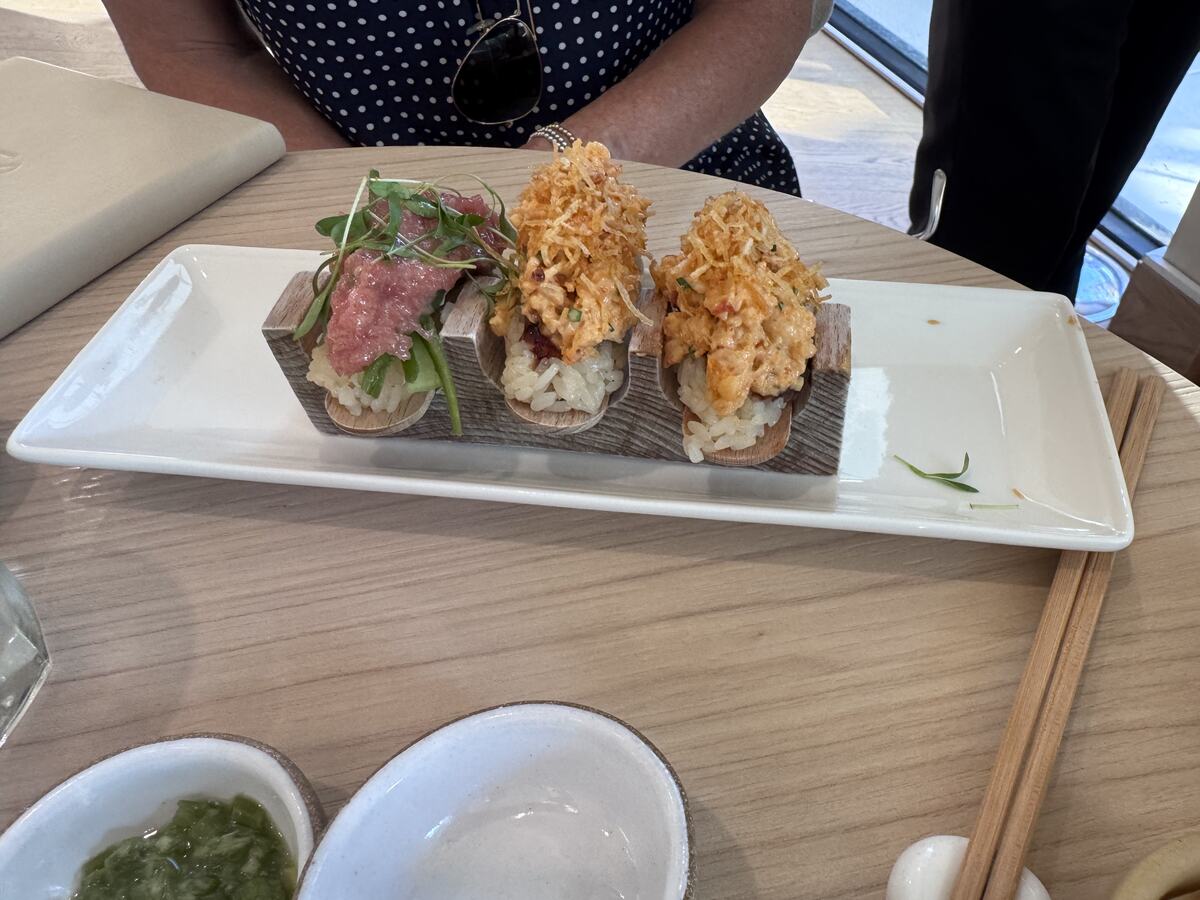 A float of temaki toppings on sticks, ready to be wrapped in nori at Sora Brentwood