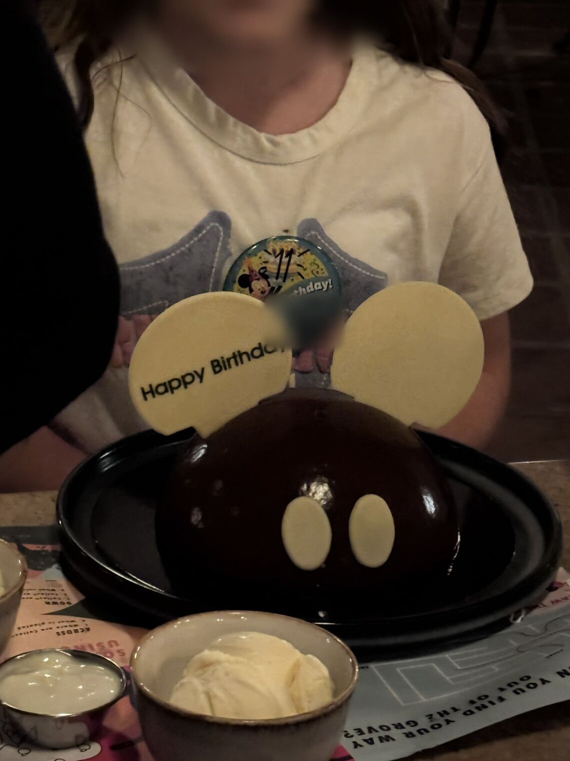 Mickey-shaped chocolate birthday cake at Wine Country Trattoria in Disney California Adventure