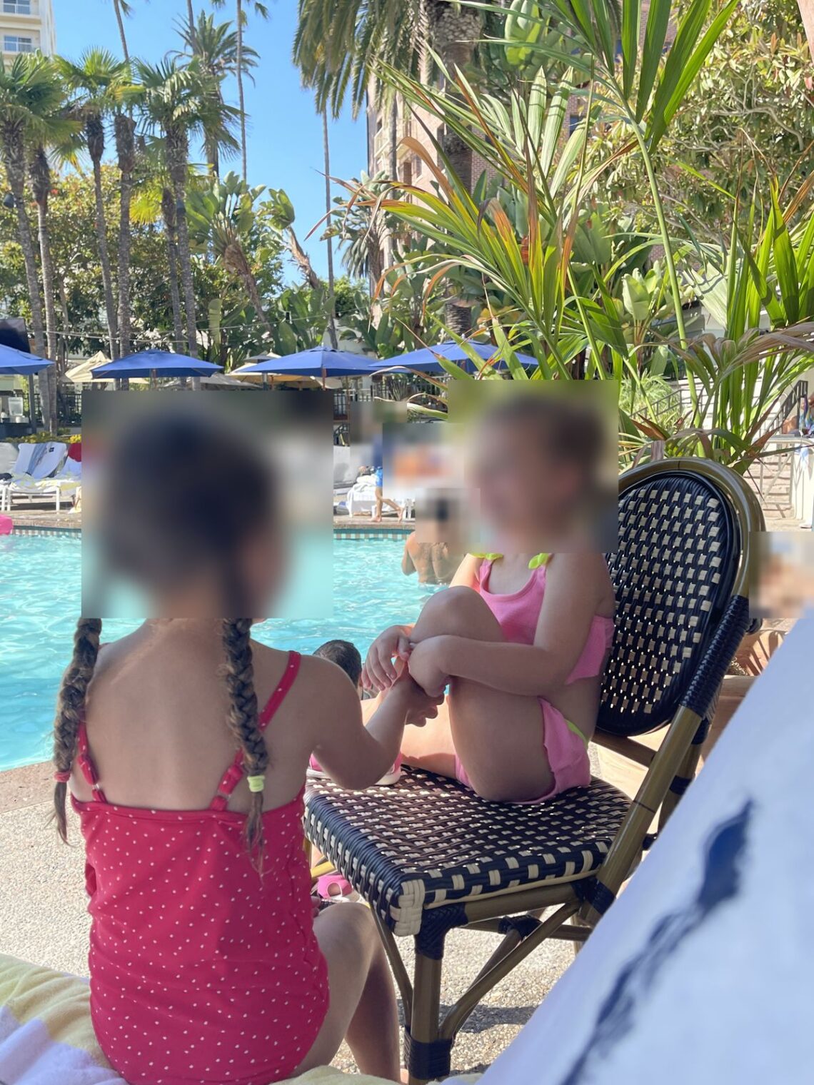 Kids by the pool at the Fairmont Miramar next to Fig Santa Monica