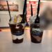 Two hot fudge sundaes with whipped cream and chocolate squares at Ghirardelli