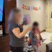 Mom and daughter explaining the hotel scavenger hunt in the party suite