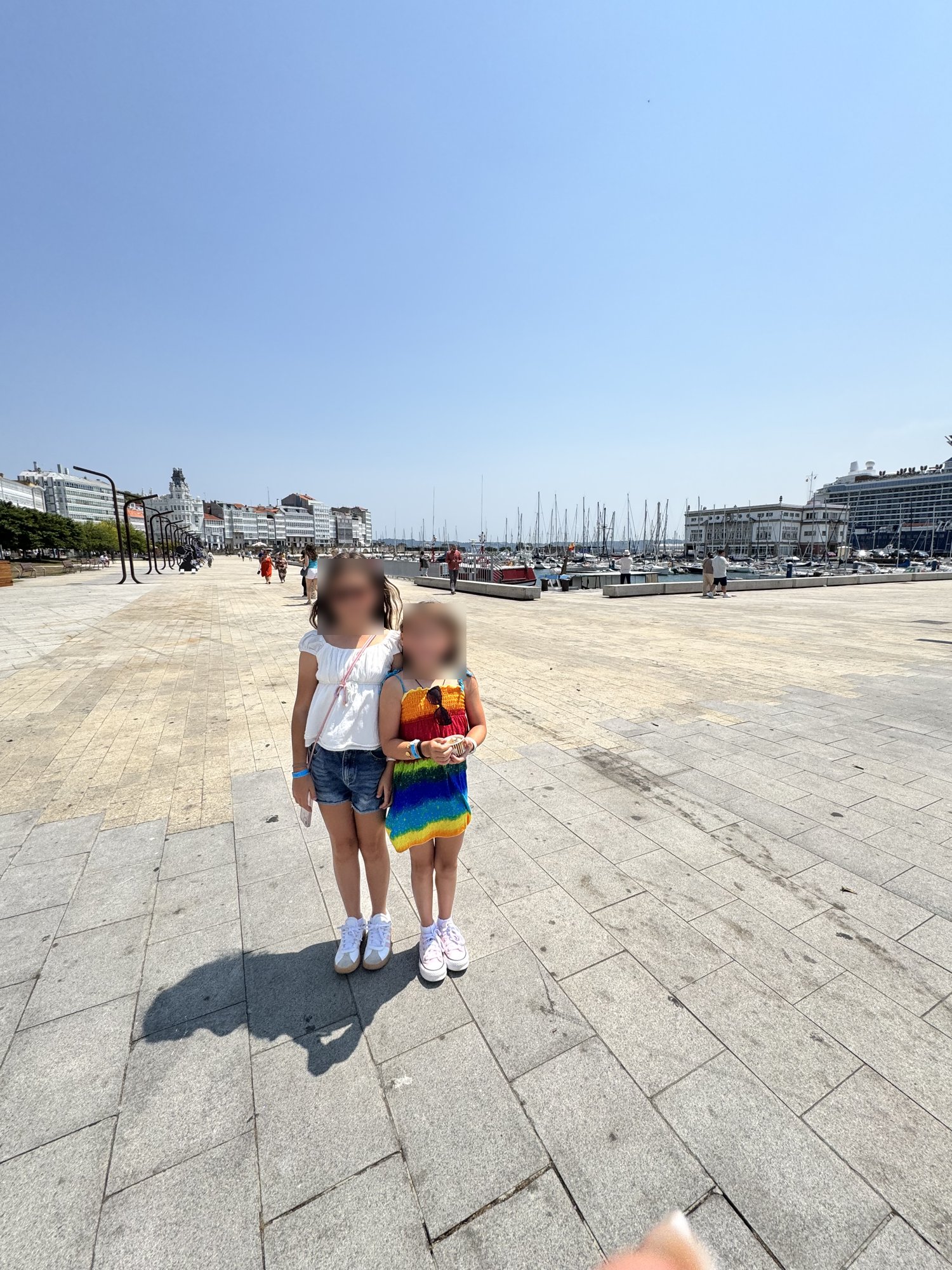The marina promenade at the La Coruña cruise port with glass-balconied galerías buildings
