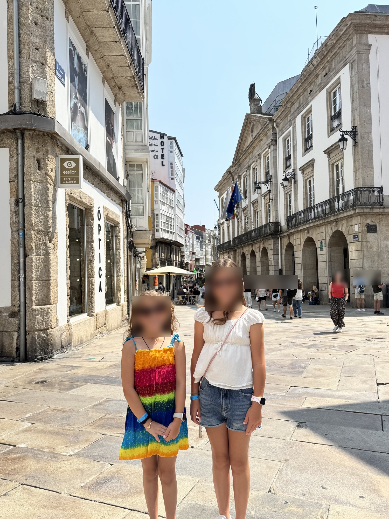 Two girls on a pedestrian street in La Coruña’s old town