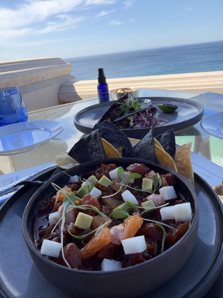 Ahi tuna tartare with avocado, jicama and blue corn chips at 180blu
