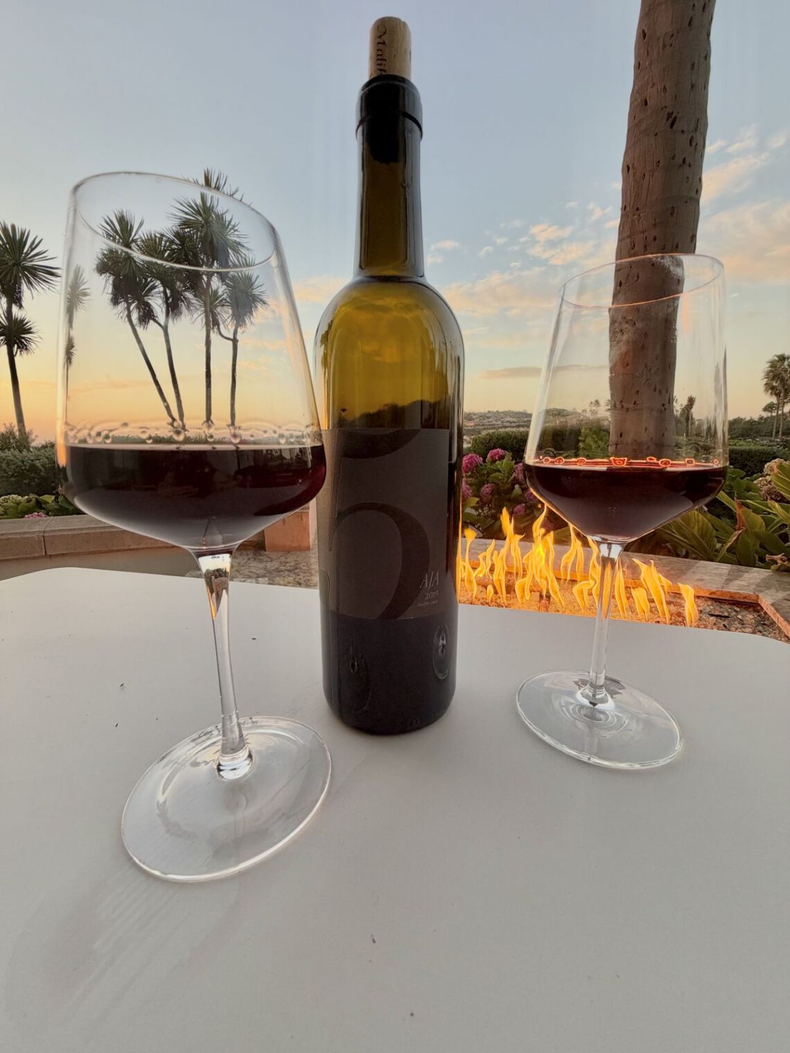 AJA 2019 5 Red Blend with two glasses on our fire pit patio at sunset, Ritz-Carlton Laguna Niguel