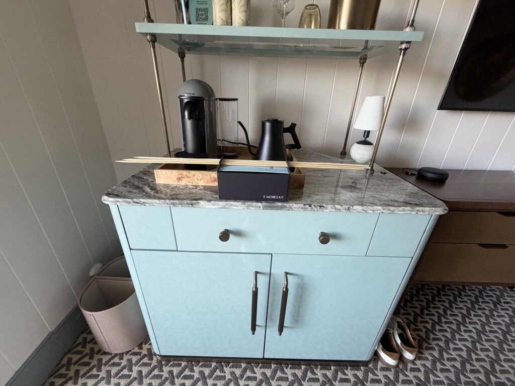 In-room coffee bar with Nespresso machine, kettle and s'mores kit with skewers