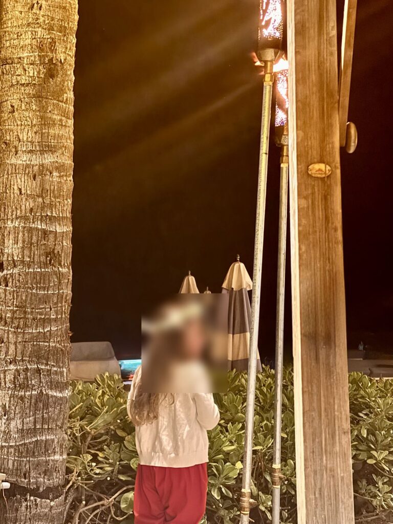 Tiki torches at Beach House by Roy Yamaguchi at night