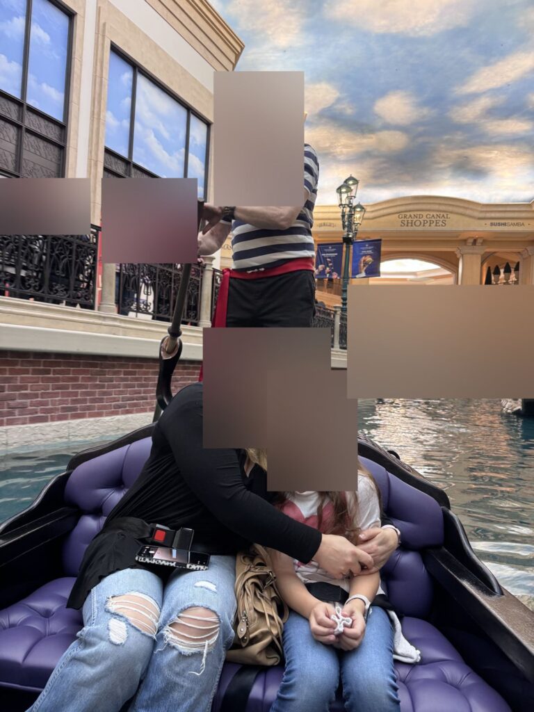 Mother and daughter on a gondola ride on the Grand Canal inside The Venetian